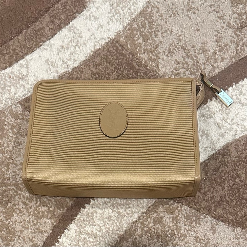 YSL Gold clutch with the zipper closure